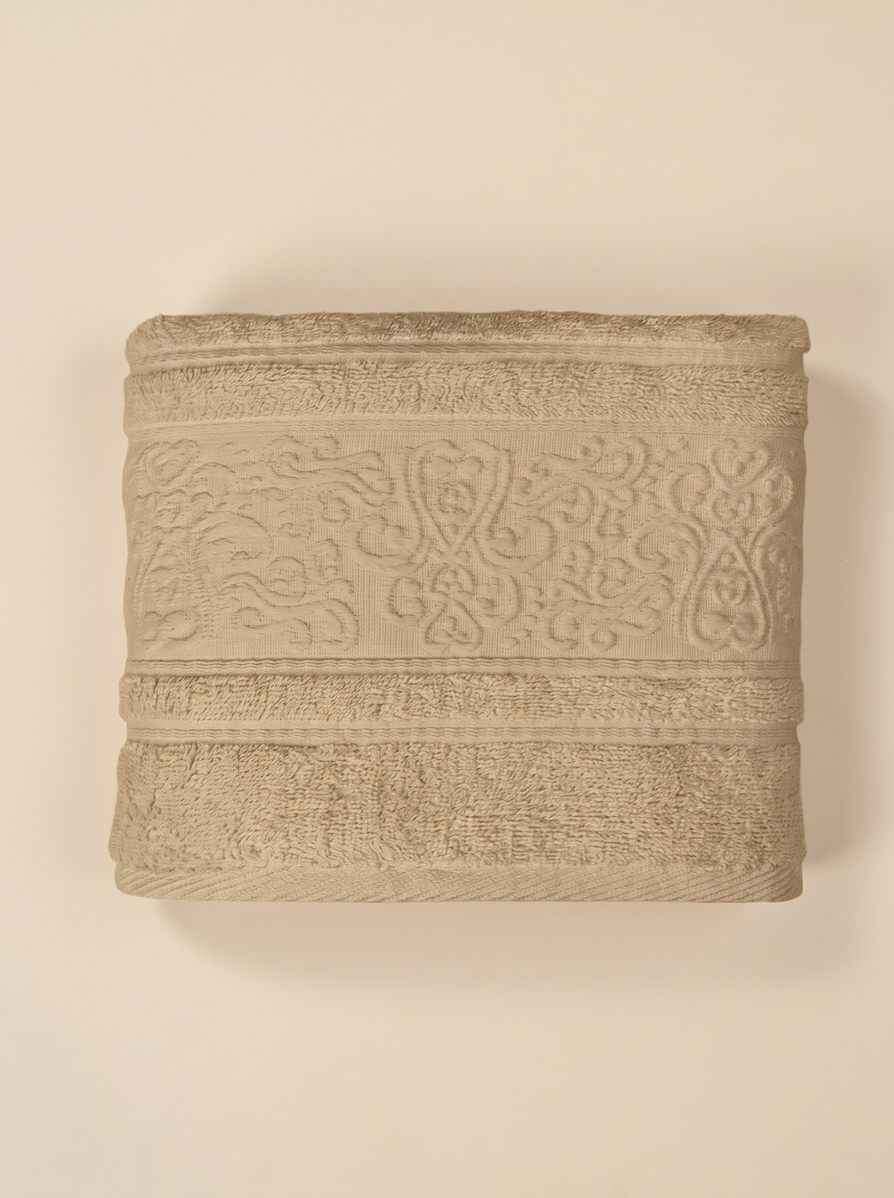 Linoa 450 Hudoo in sand 100% cotton towel, studio product shot