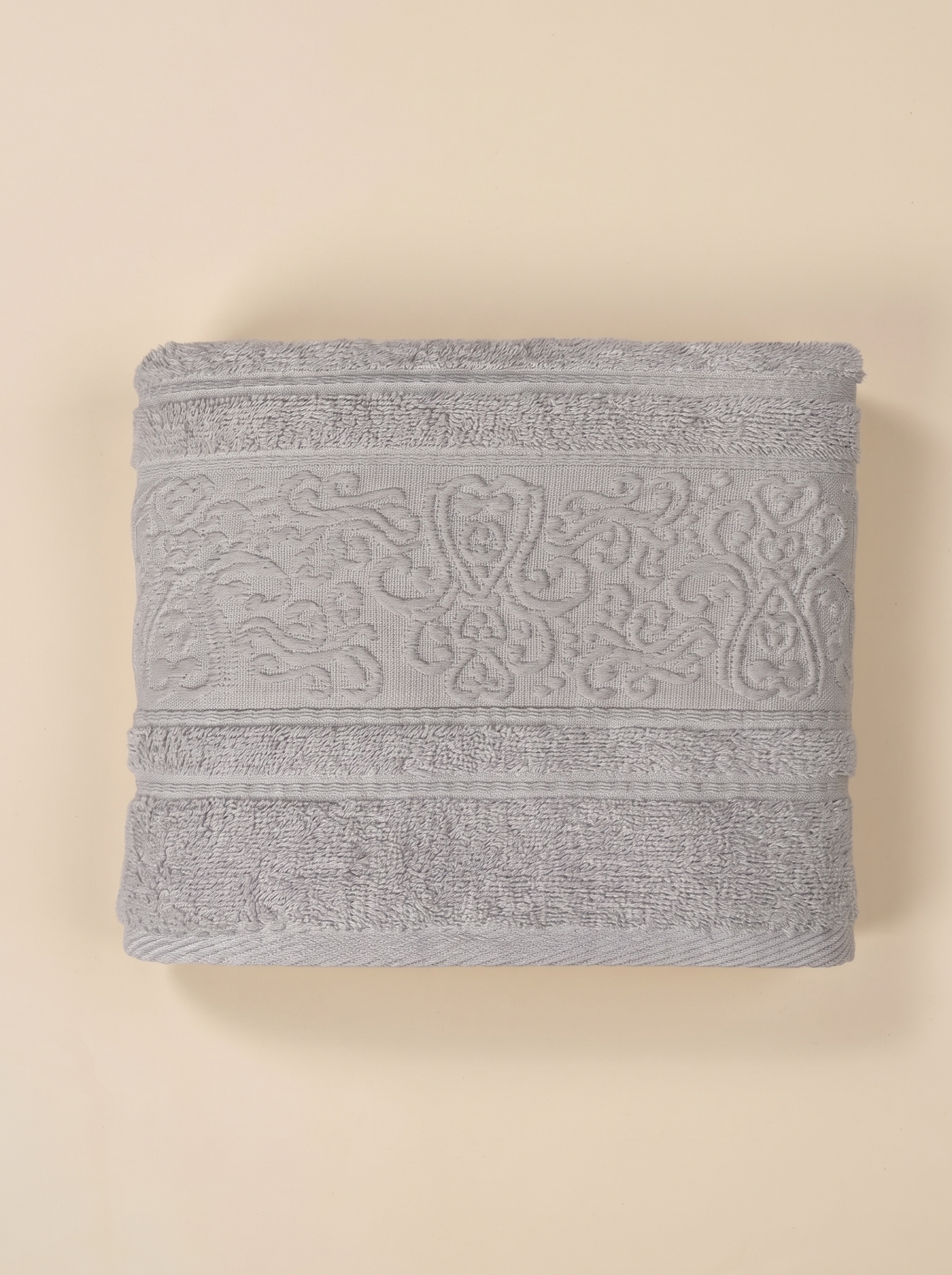 Linoa 450 Hudoo in grey 100% cotton towel, studio product shot