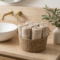 Linoa 450 Sakeena in mocha brown 100% cotton towel, face towel folded in a woven basket