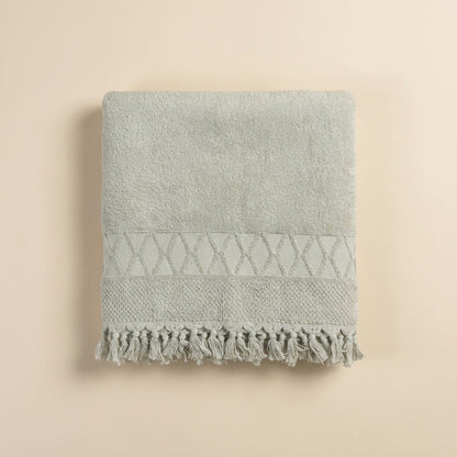 Linoa 450 Sakeena in sage green 100% cotton towel, studio product shot