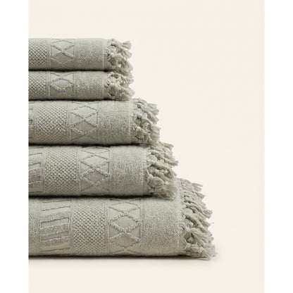 Linoa 450 Sakeena in sage green 100% cotton towel, neatly folded stack
