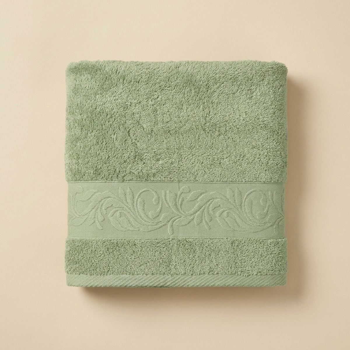 Linoa 550 Reesha Feather in sage green 100% cotton towel, studio product shot
