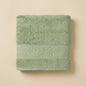 Linoa 550 Reesha Feather in sage green 100% cotton towel, studio product shot