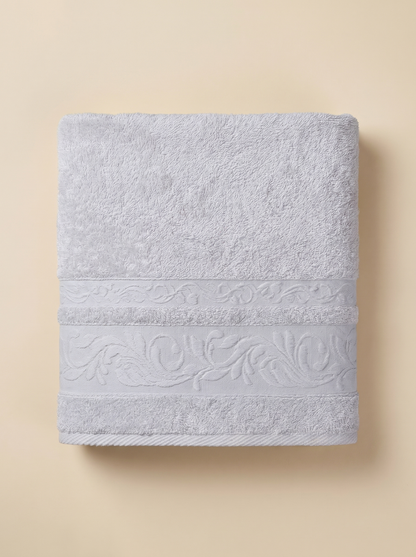 Linoa 550 Reesha Feather in white 100% cotton towel, studio product shot