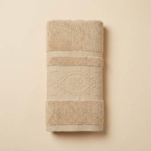 Linoa 650 Fakhm Luxe in mocha brown 100% cotton towel, studio product shot