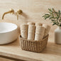 Linoa 650 Fakhm Luxe in mocha brown 100% cotton towel, face towel folded in a woven basket