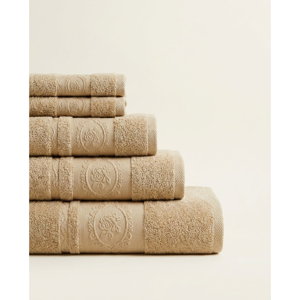 Linoa 650 Fakhm Luxe in mocha brown 100% cotton towel, neatly folded stack