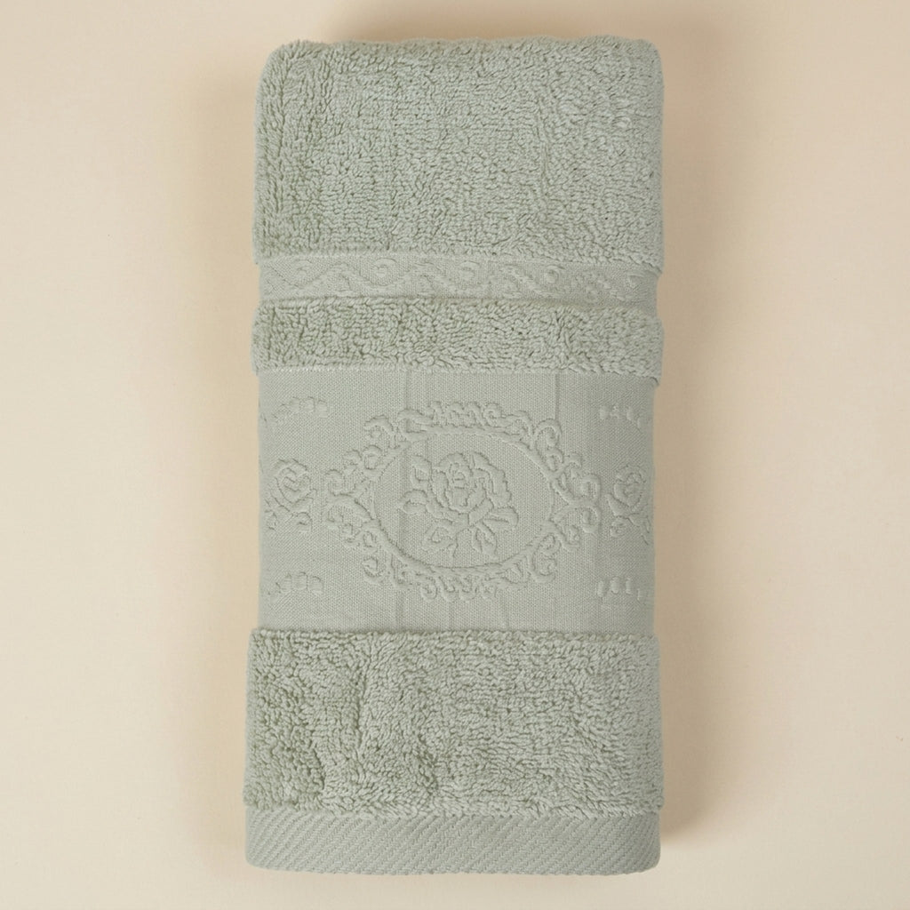 Linoa 650 Fakhm Luxe in sage green 100% cotton towel, studio product shot
