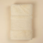 Linoa 650 Fakhm Luxe in off-white 100% cotton towel, studio product shot
