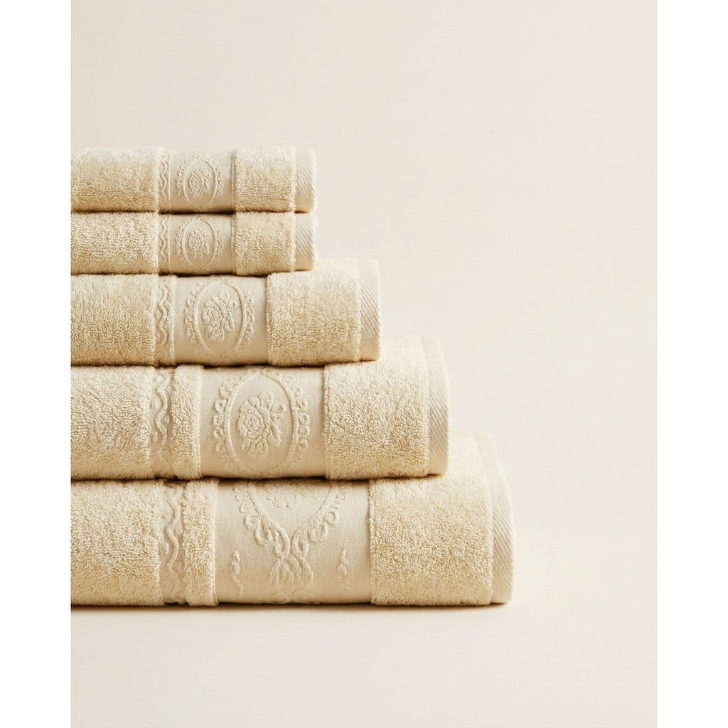 Linoa 650 Fakhm Luxe in off-white 100% cotton towel, neatly folded stack