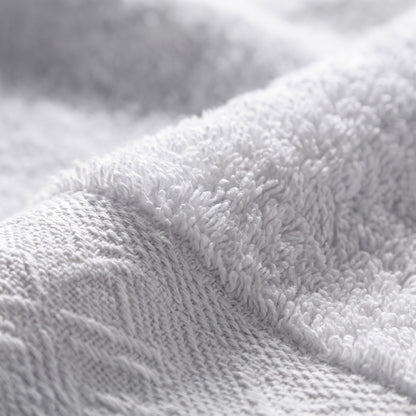 Linoa 650 Fakhm Luxe in white 100% cotton towel, macro close-up of the cotton pile