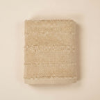 Linoa 650 Naem+ Spa in sand tan 100% cotton towel, studio product shot