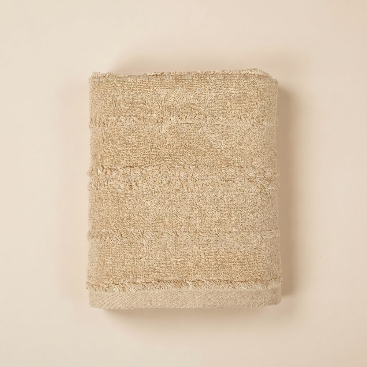 Linoa 650 Naem+ Spa in sand tan 100% cotton towel, studio product shot