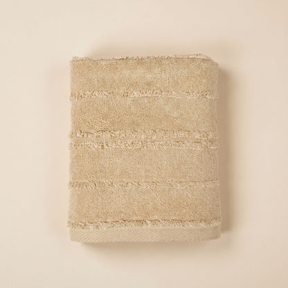 Linoa 650 Naem+ Spa in sand tan 100% cotton towel, studio product shot