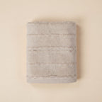 Linoa 650 Naem+ Spa in grey 100% cotton towel, studio product shot