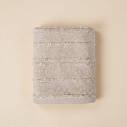 Linoa 650 Naem+ Spa in grey 100% cotton towel, studio product shot