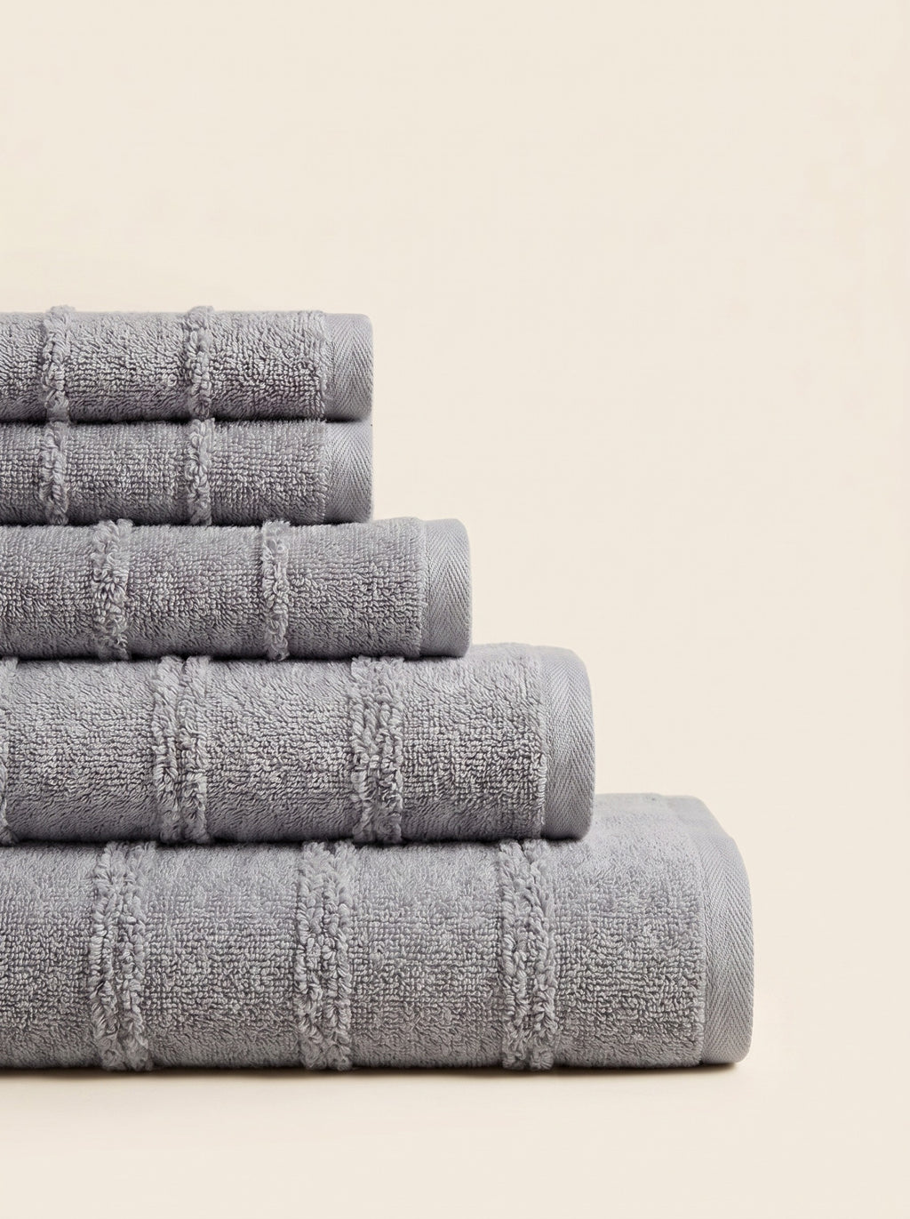 Linoa 650 Naem+ Spa in grey 100% cotton towel, neatly folded stack