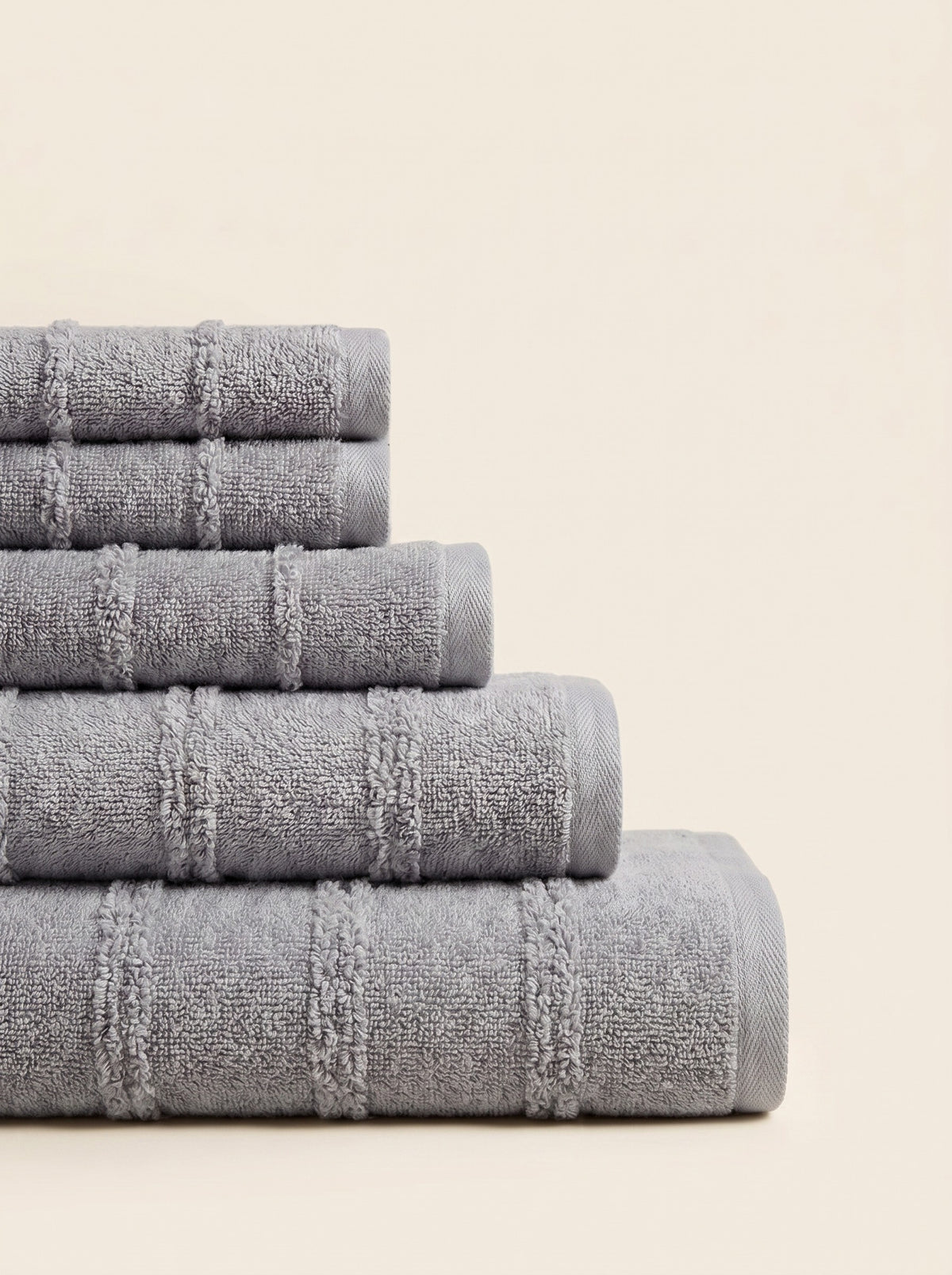 Linoa 650 Naem+ Spa in grey 100% cotton towel, neatly folded stack