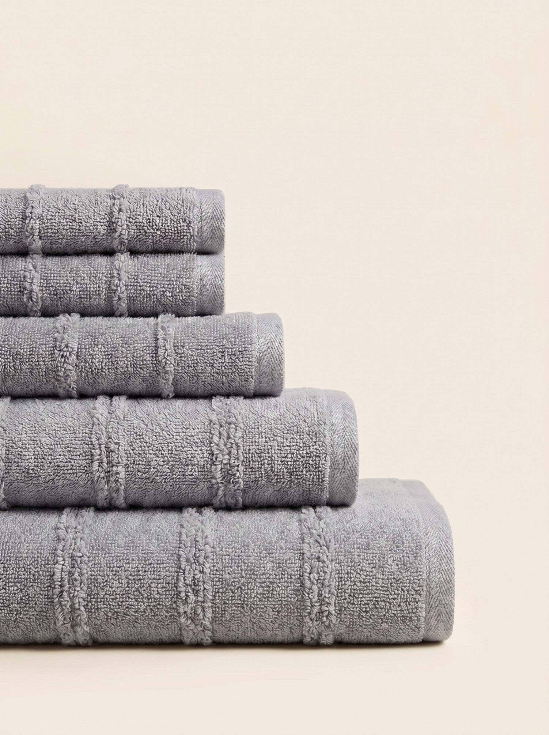 Linoa 650 Naem+ Spa in grey 100% cotton towel, neatly folded stack
