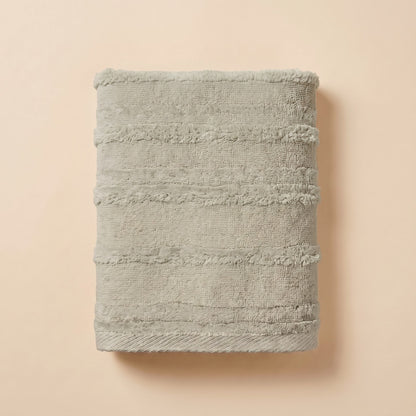 Linoa 650 Naem+ Spa in sage green 100% cotton towel, studio product shot