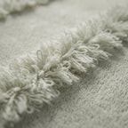 Linoa 650 Naem+ Spa in sage green 100% cotton towel, macro close-up of the raised tufted stripe weave