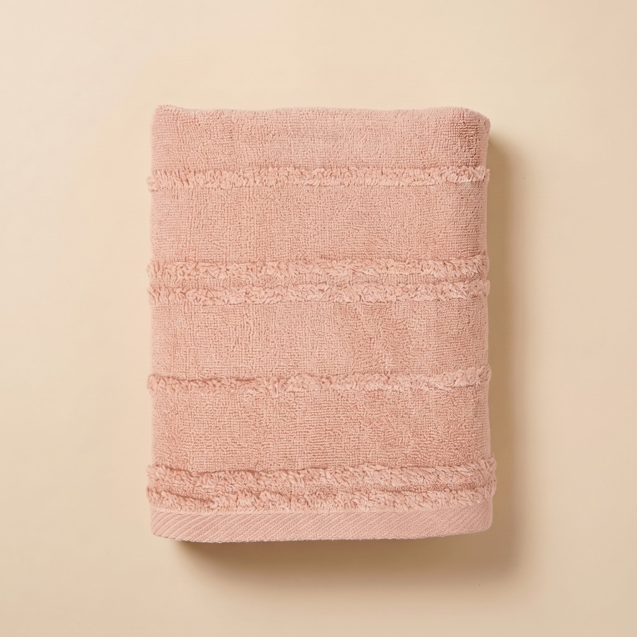 Linoa 650 Naem+ Spa in blush pink 100% cotton towel, studio product shot