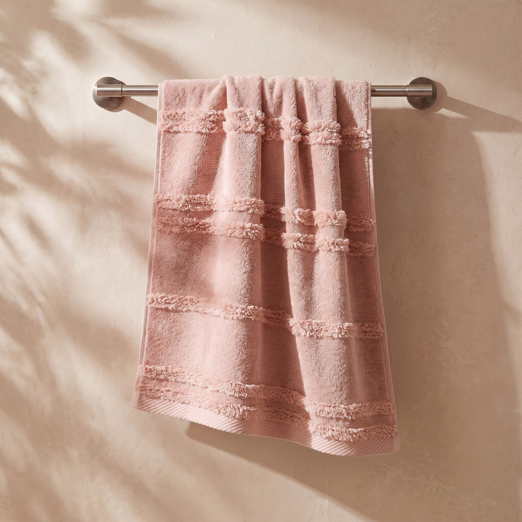 Linoa Naem+ Spa blush pink towel hanging, tufted stripe weave