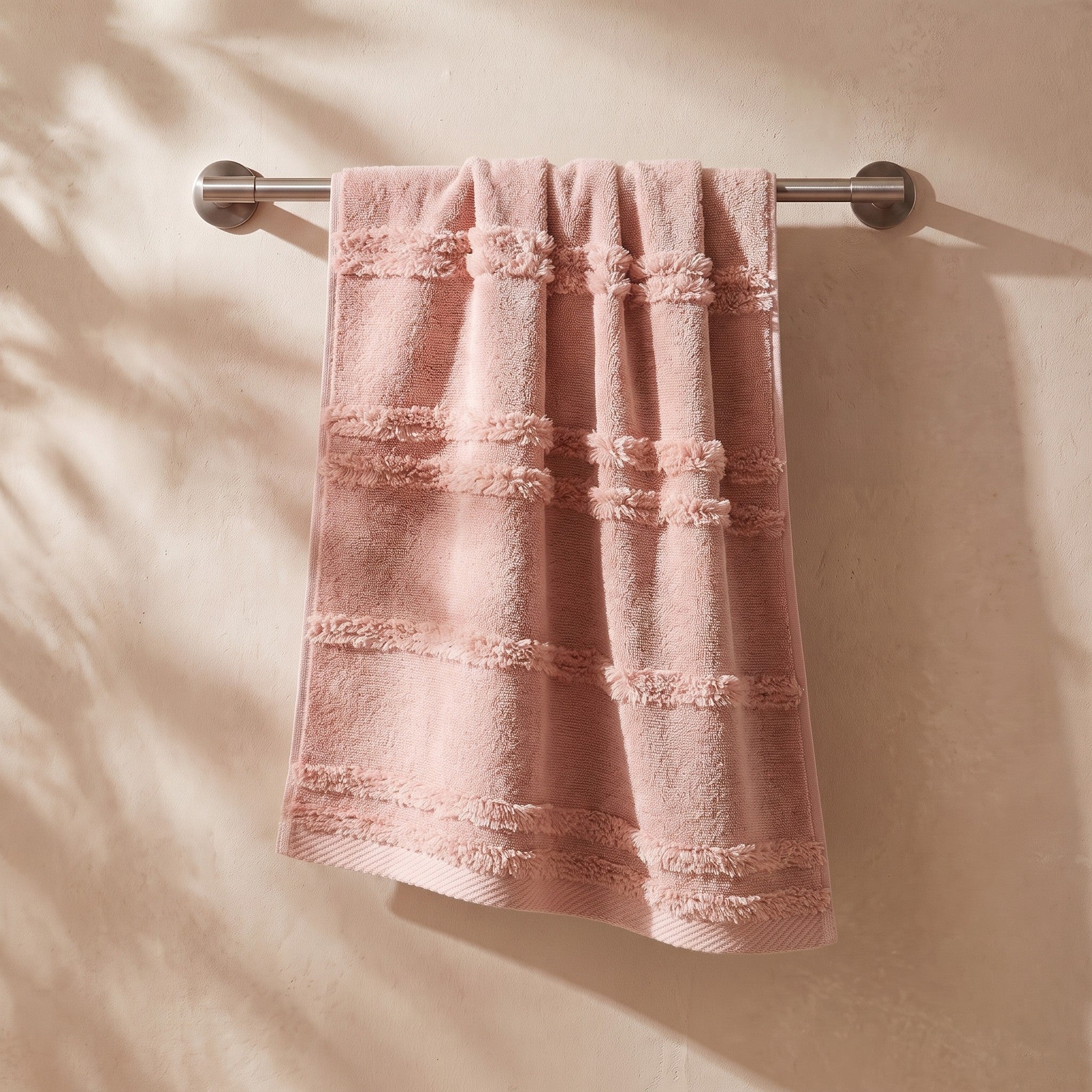 Linoa Naem+ Spa blush pink towel hanging, tufted stripe weave