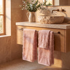Linoa 650 Naem+ Spa in blush pink 100% cotton towel, styled bathroom scene