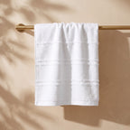 Linoa 650 Naem+ Spa in white 100% cotton towel, draped over a rail