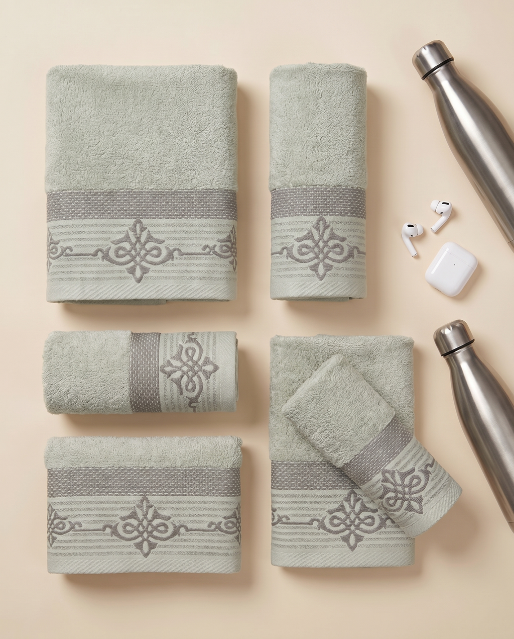 Linoa Gym Raha towel set, Sage colourway, flatlay shot