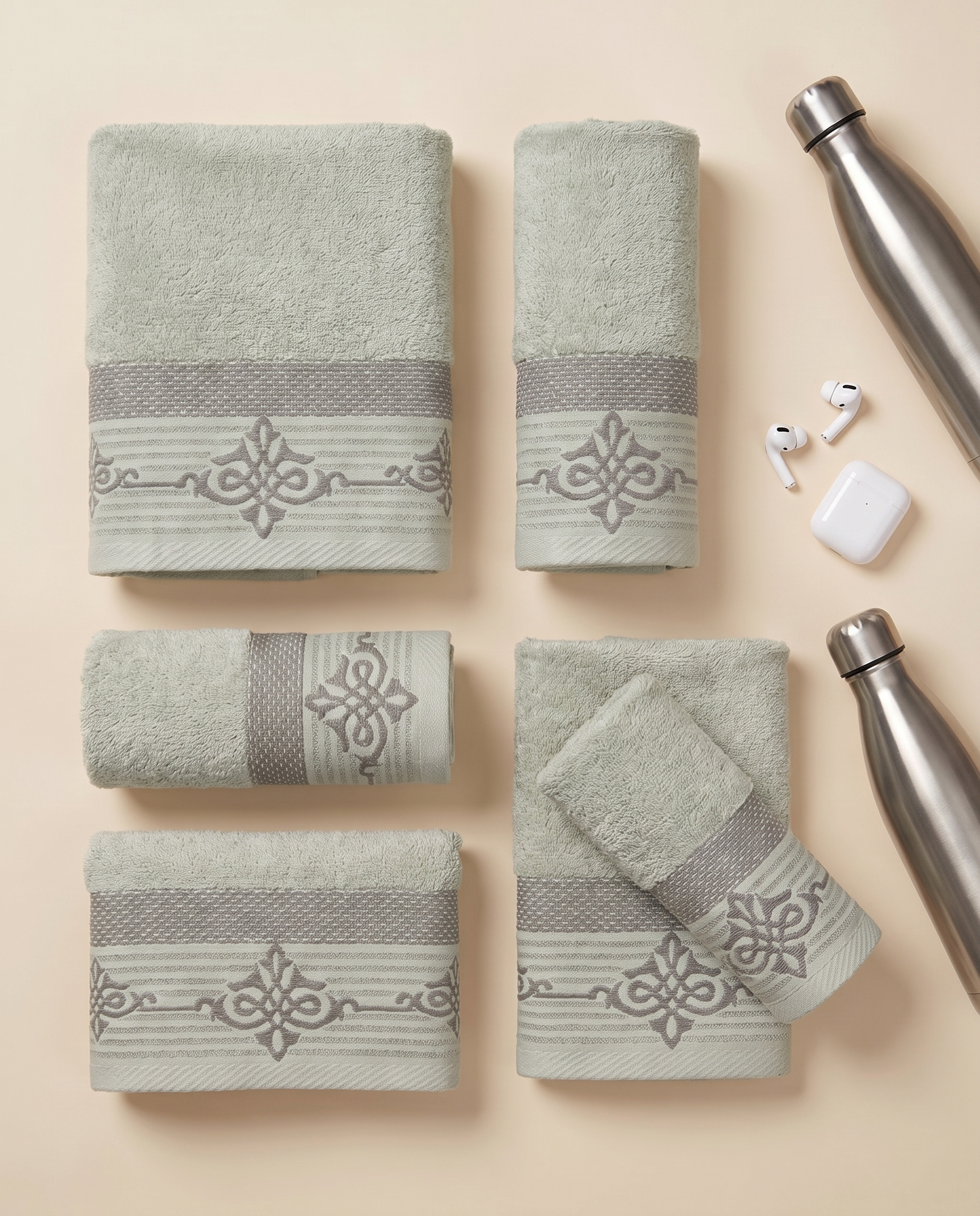 Linoa Gym Raha towel set, Sage colourway, flatlay shot