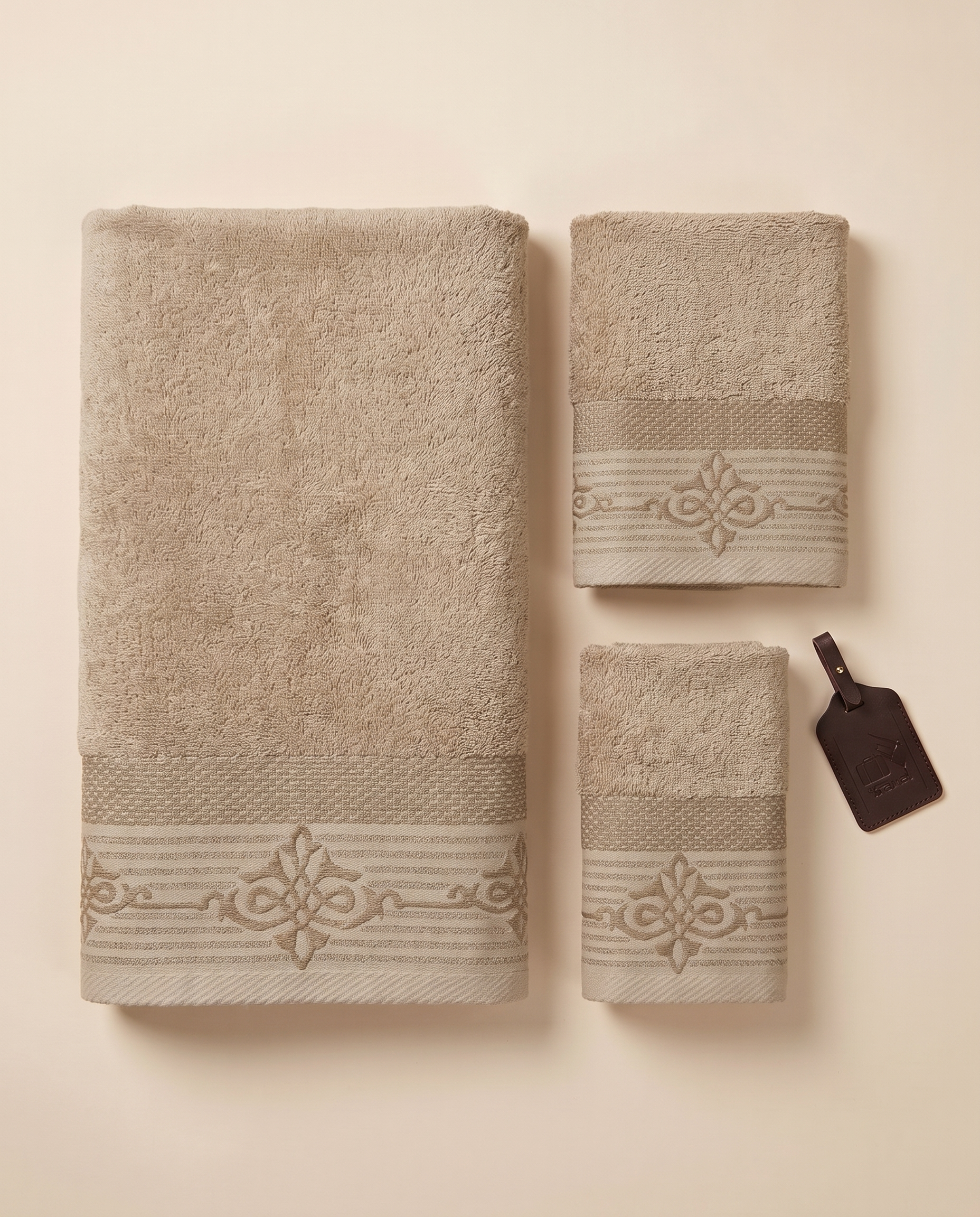 Linoa Travel Raha towel set, Sand colourway, flatlay shot