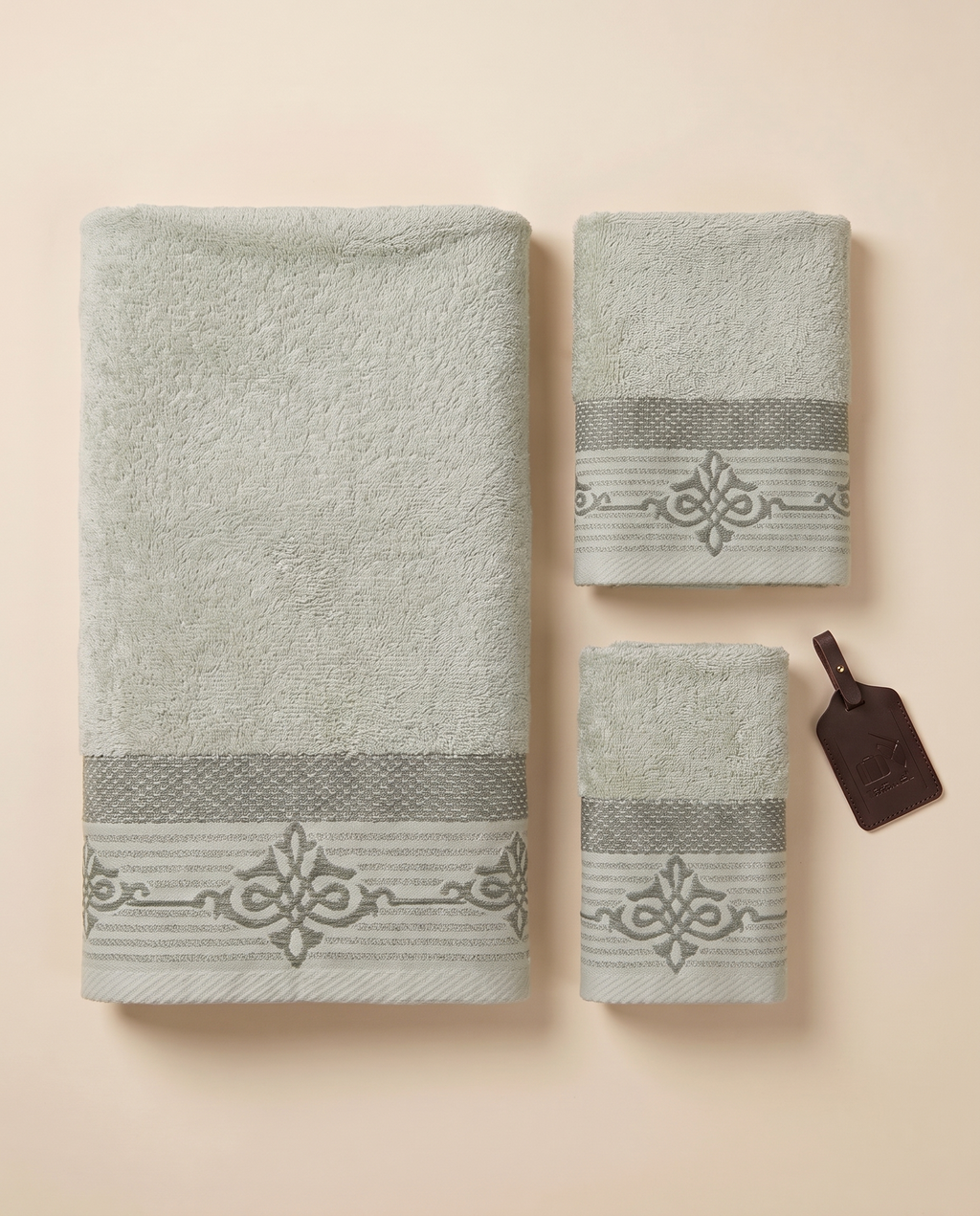 Linoa Travel Raha towel set, Sage colourway, flatlay shot