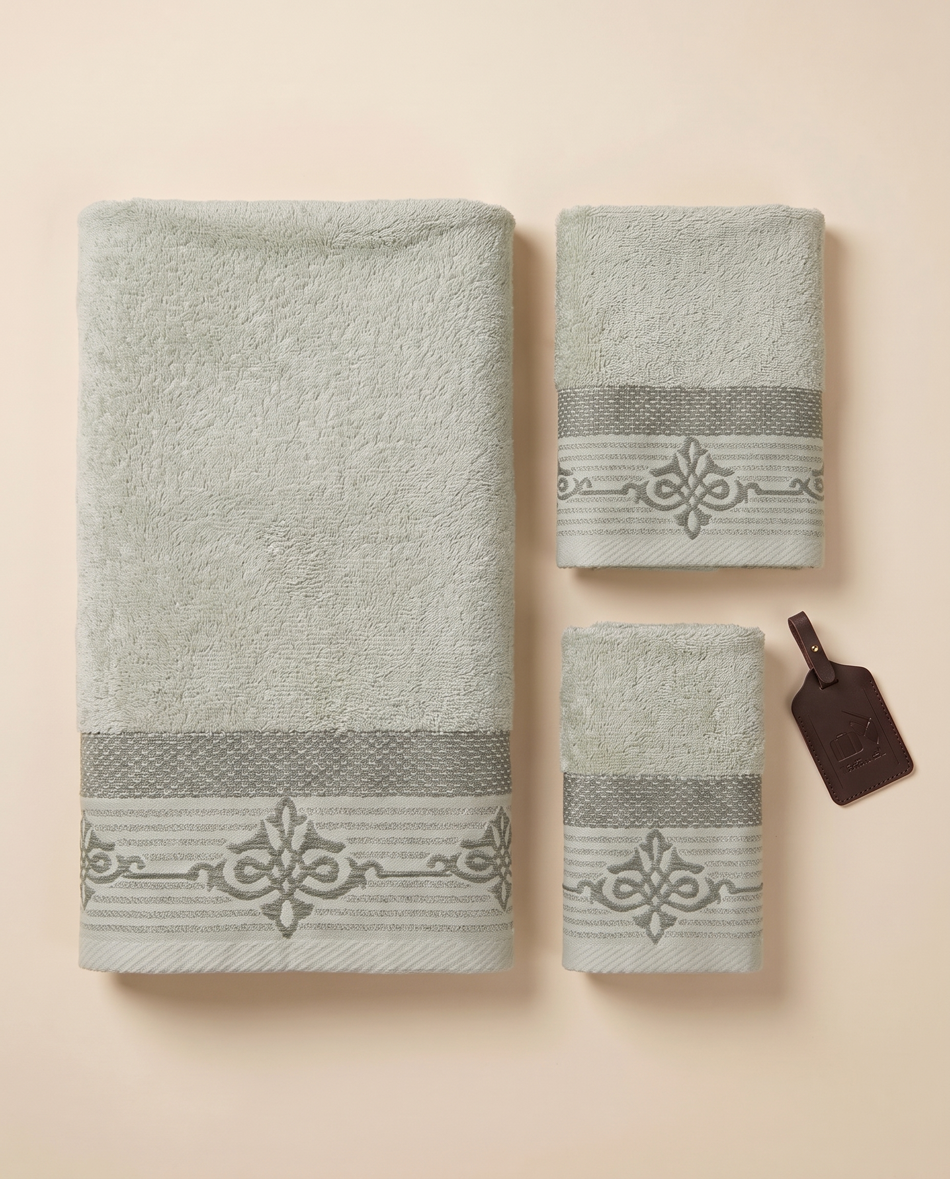 Linoa Travel Raha towel set, Sage colourway, flatlay shot