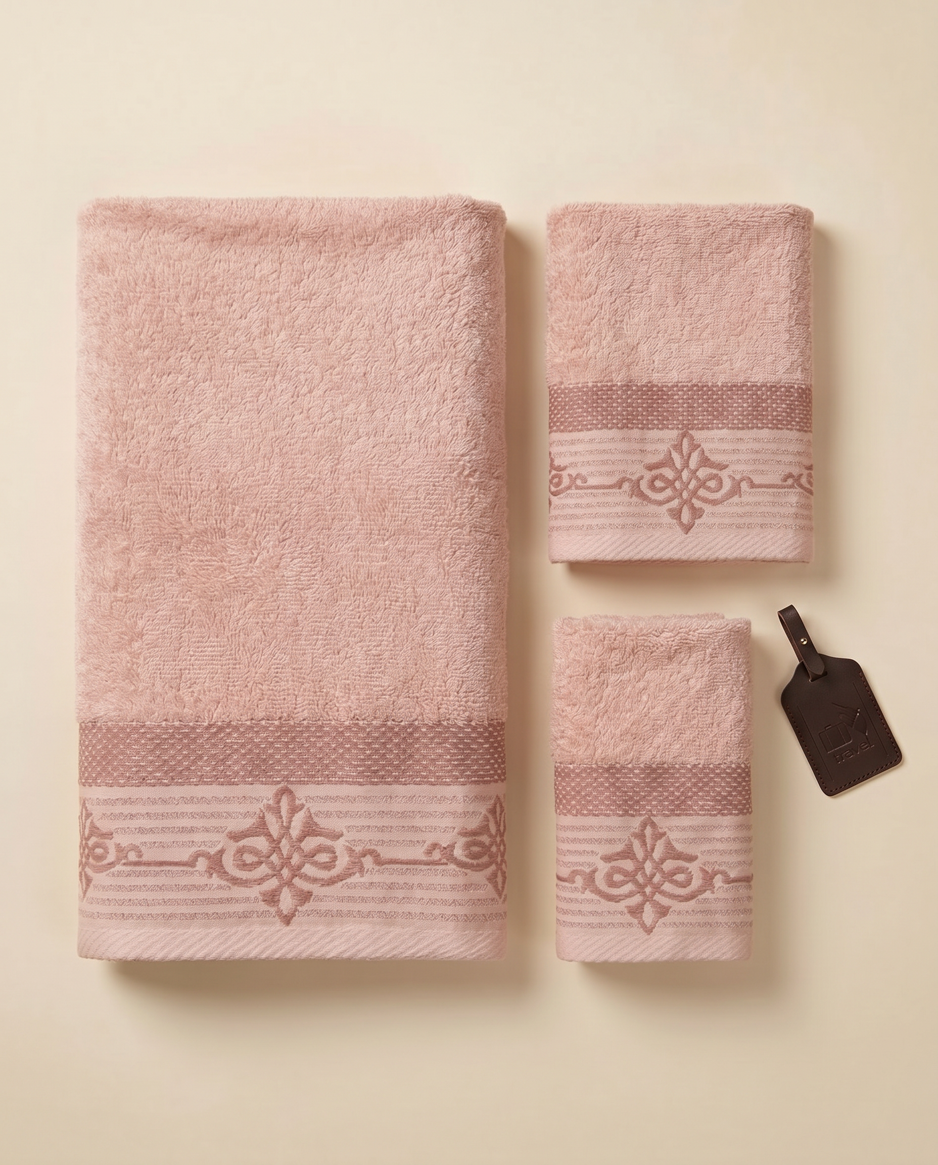 Linoa Travel Raha towel set, Blush Pink colourway, flatlay shot