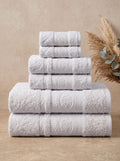 Linoa Signature Set · Fakhm 650 in White, 6-piece folded stack with rose-medallion border