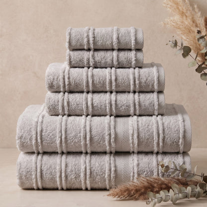 Linoa Signature Naem+ towel set in grey, folded stack, tufted stripe weave